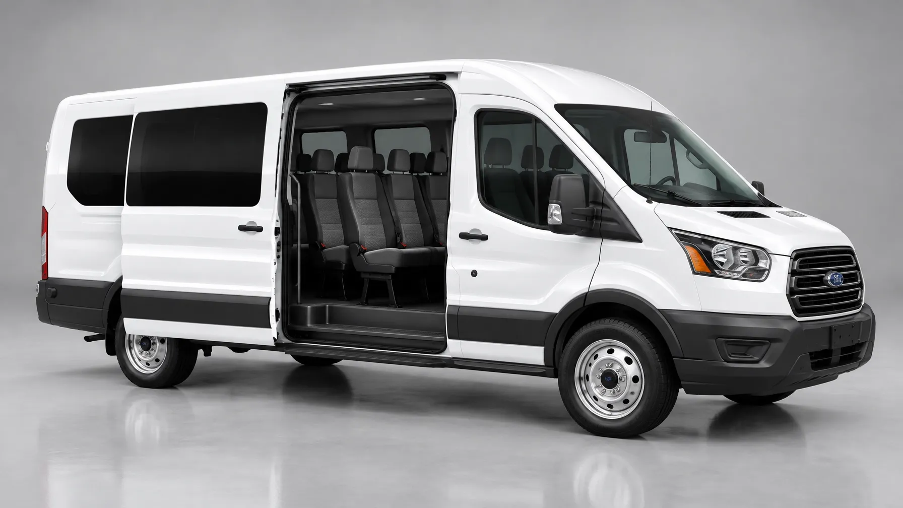 White 2023 Ford Transit 11-passenger van with its sliding door open and passenger seats visible for group travel